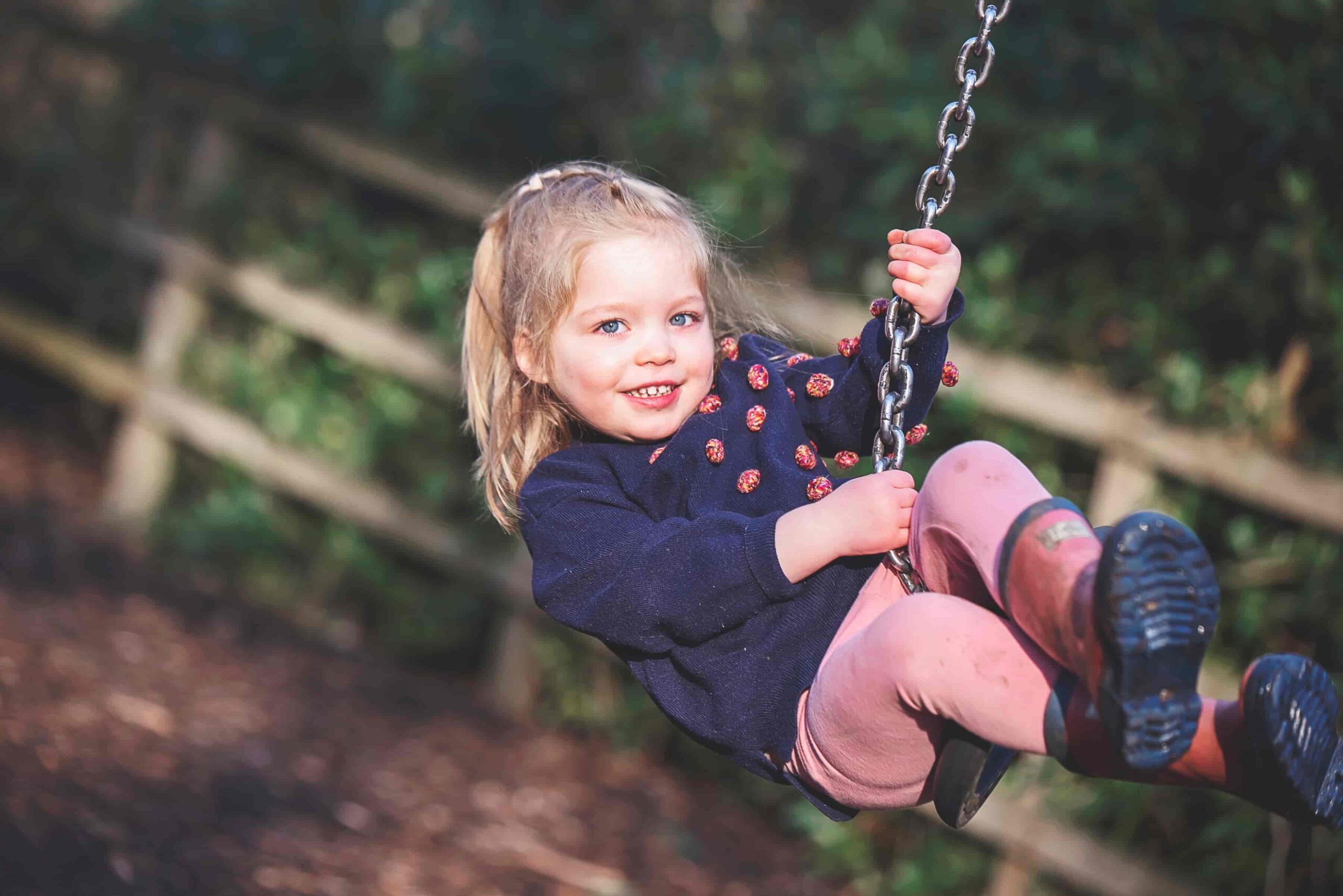 Child in the playground at Thorp Perrow